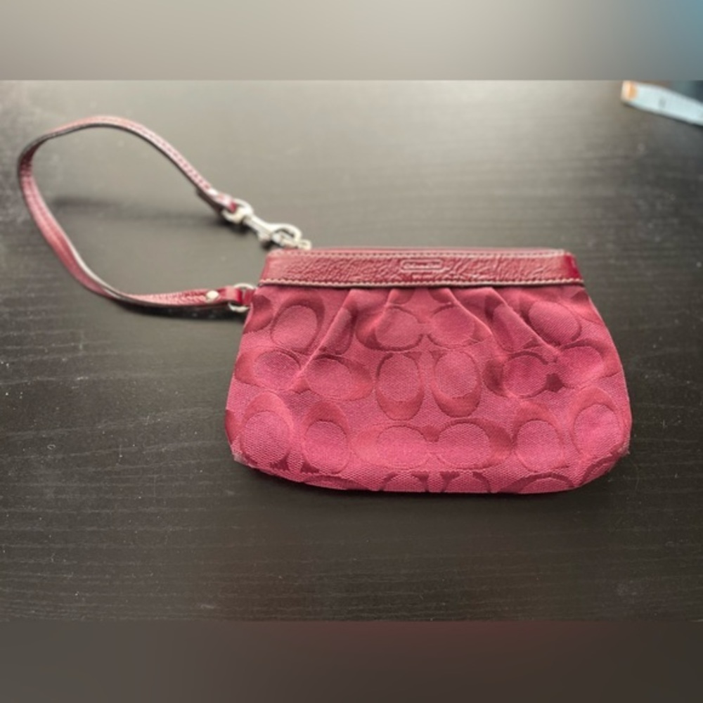 Coach wristlet. Red. Approximately 7 x‎ 4.5 inches.